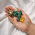 Golden and green abundance crystals from prosperity intention kit